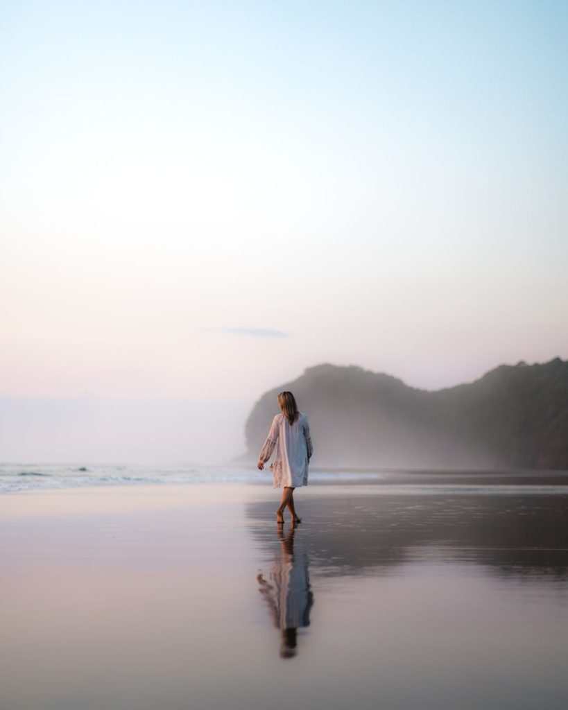Woman in a bikini by the water