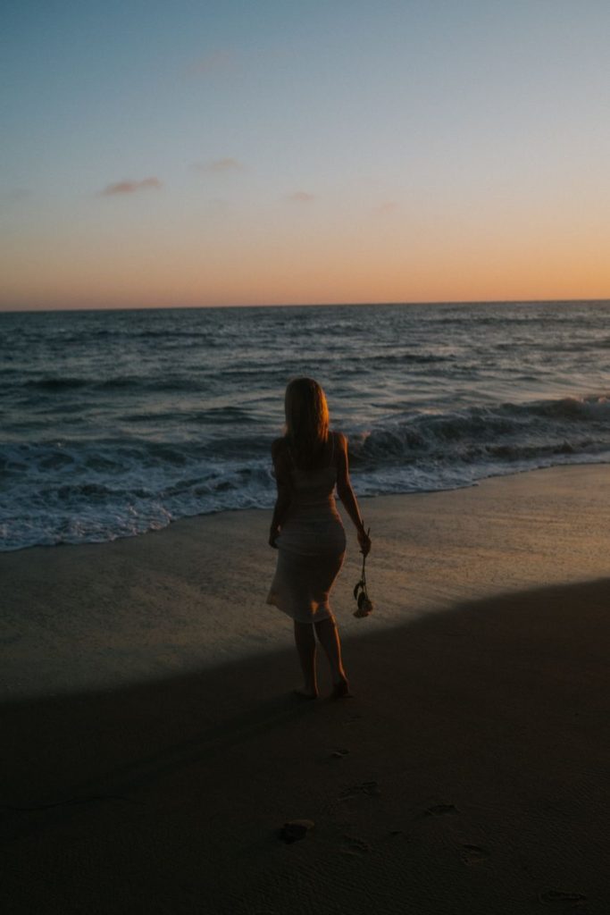 Woman in a bikini by the water