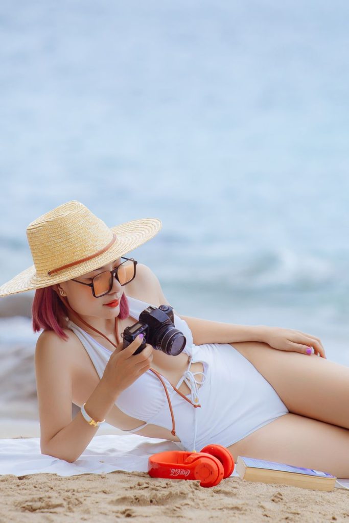 Woman in a bikini by the water